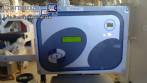 Etiquetadora automtica autoadhesiva para botellas cilndricas