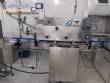 L�nea para llenado de salmuera, inserci�n manual de producto y taponado autom�tico