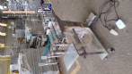Mquina llenadora con 2 boquillas para lquidos y enroscador de tapn pilfer