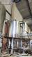 Llenadora rotativa gravimtrica de acero inoxidable con cabina