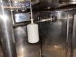 Llenadora rotativa gravim�trica de acero inoxidable con cabina