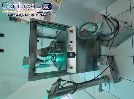 Comprimidora rotativa Neuberger, 20 punzones, 900 comprimidos por minuto.