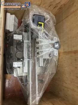 Llenadora autom�tica de acero inoxidable con 4 boquillas para l�quidos.