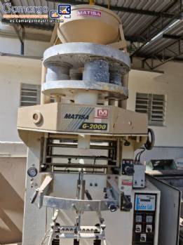 Máquina dosificadora y envasadora automática Matisa para productos granulados y en gránulos. Máquina dosificadora y envasadora automática Matisa para productos granulados y en gránulos.